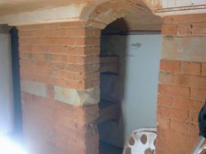 Internal walls cleaned to expose original brick